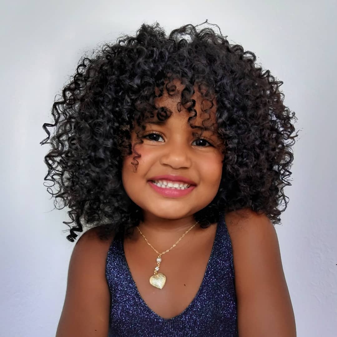 How to Care for Your Kids' Curls This Summer