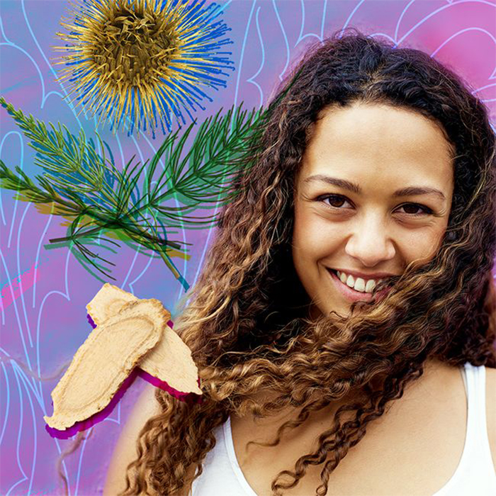 woman with long hair and hair growth herbs